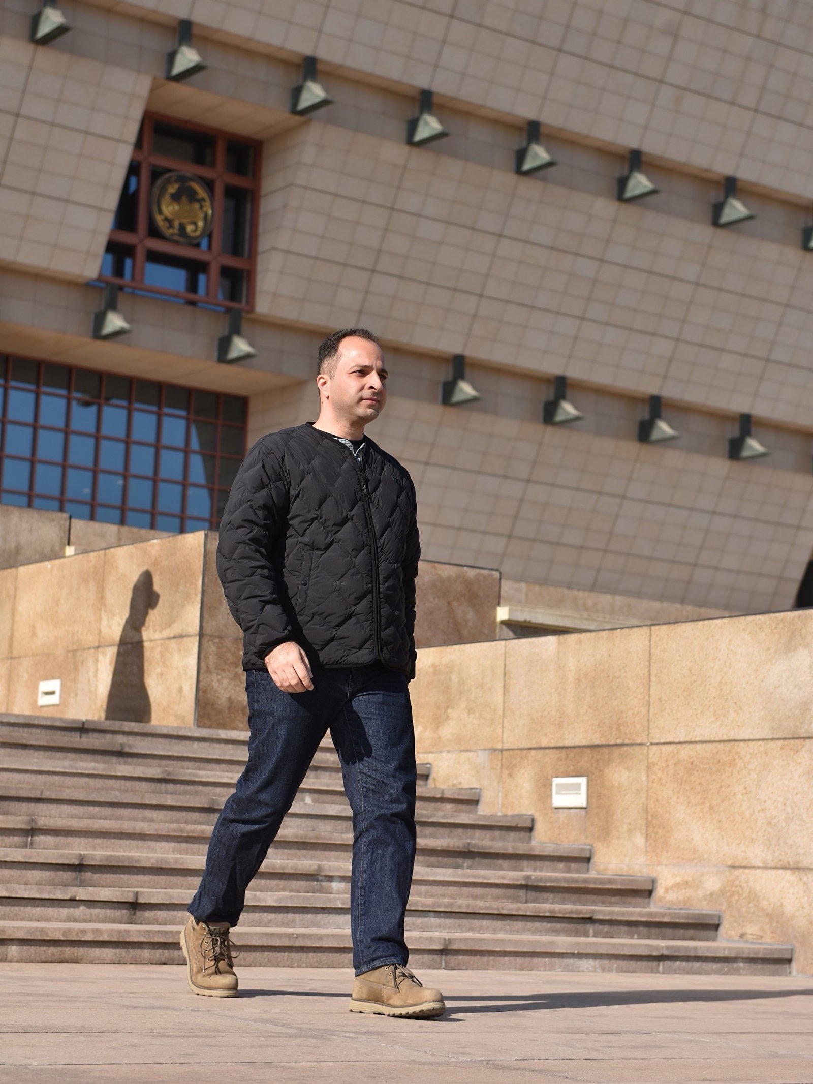 Shenzhen Expat walking in an architectural setting